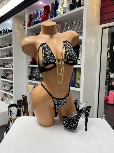 Midnight Chain Bikini featuring a black rhinestone triangle bikini top with gold chain detail and matching rhinestone thong bottoms.