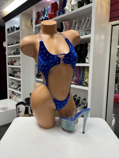 Royal Blue Crystal Microkini featuring crystal embellishments, lace-up front, side cutouts, and a high-cut one-piece swimsuit.