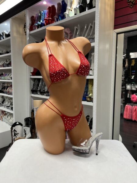 Red rhinestone string bikini with a triangle top, adjustable string bottoms, and sparkling crystal embellishments.
