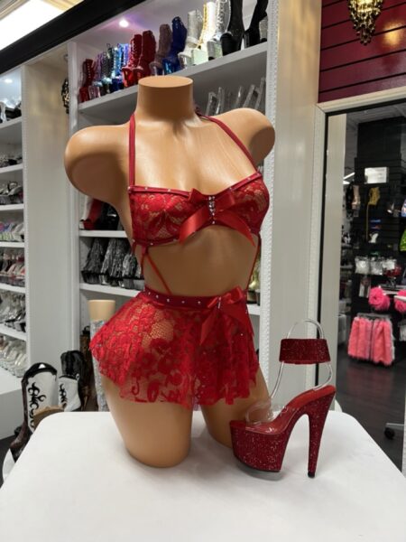 Red lace skirt bra set with a floral lace underwire bra, matching lace mini skirt, satin bows, and rhinestone accents.