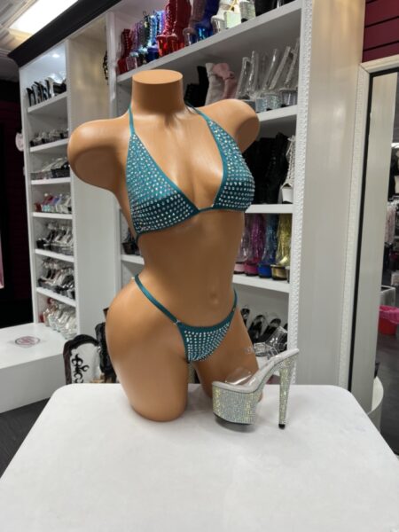 Teal rhinestone bikini featuring a triangle halter top and matching rhinestone thong with sparkling crystal embellishments.