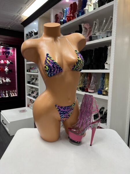 Neon Splash Micro Bikini featuring a colorful abstract print, rhinestone embellishments, triangle top, and matching micro thong.
