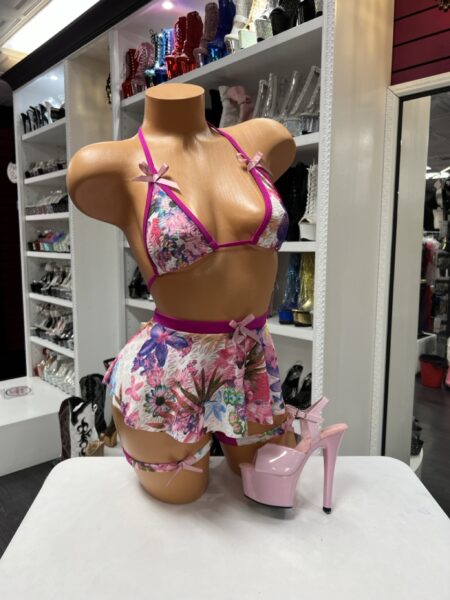 Floral Bow Bikini Set featuring a floral triangle bikini top, matching thong, wrap mini skirt, and two coordinating leg garters