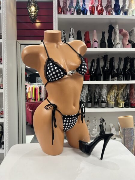 Gingham Lace Bikini Set featuring a black and white checkered print, decorative oval buckle accent, black lace trim, triangle bikini top, and adjustable side-tie thong.