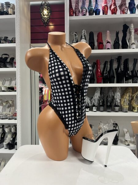 Gingham Lace Monokini with black and white gingham print, decorative lace-up front, plunging halter neckline, and black lace trim.