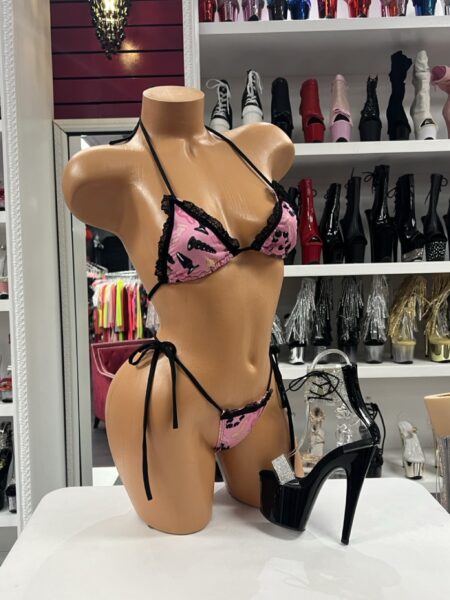 Pink Toy Print Bikini with black lace trim, toy-inspired print, triangle bikini top, and adjustable side-tie thong.