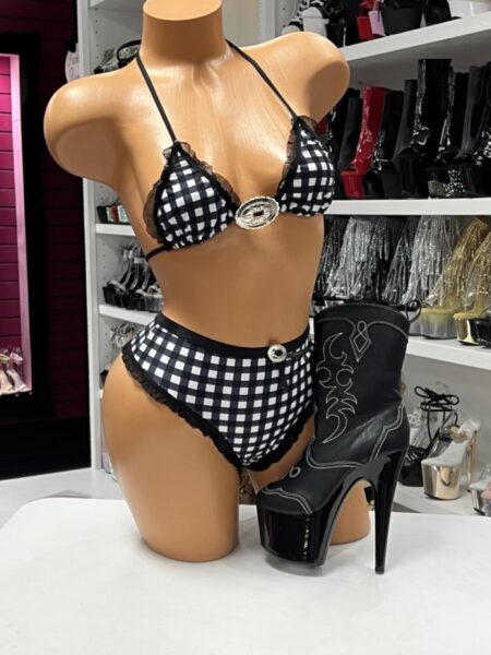 Gingham Cowgirl Bikini Set featuring a black and white gingham print, black lace trim, silver concho accents, adjustable triangle bikini top, and high-waisted bikini bottoms.