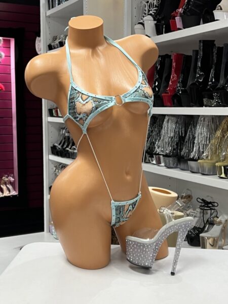 Turquoise Snake Print Slingkini featuring an exotic snake print, center O-ring detail, adjustable halter straps, and a minimalist body-flattering silhouette.