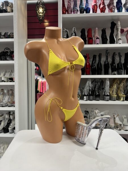 Yellow Bikini featuring a classic triangle top with adjustable string ties and matching tie-side bottoms displayed on a mannequin.