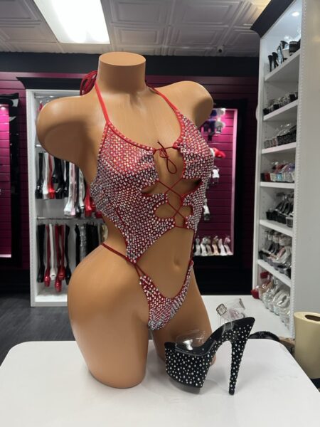 Red Sparkle Lace Romper with reflective embellishments, open front and lace-up string details