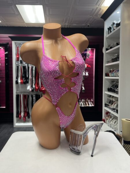 Fuchsia Lace Up Romper with sparkling embellishments, open front and strappy details