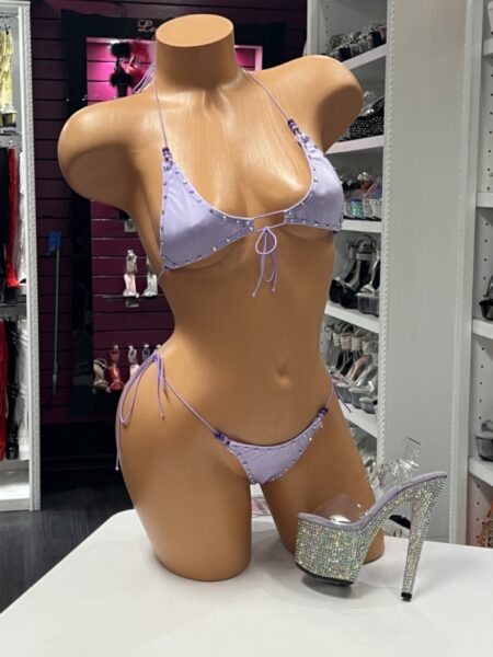 Lavender Rhinestone Bikini with adjustable triangle top and side-tie thong bottom embellished with sparkling rhinestones.