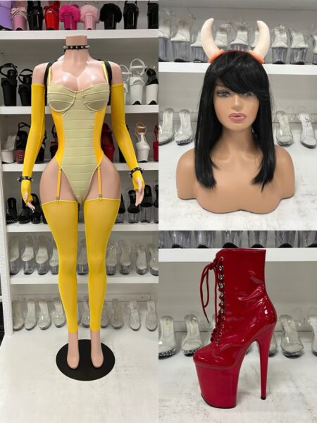 Breathing Fire Character Costume featuring a cream and yellow fitted bodysuit, matching yellow arm sleeves, thigh-high stockings, horned headpiece, and red wig.