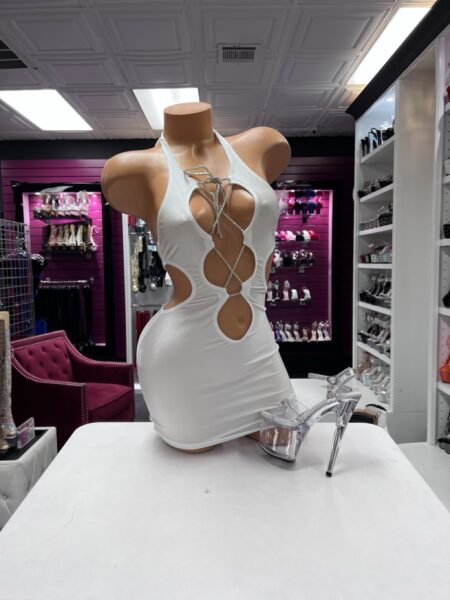 White Crystal Cutout Dress featuring a halter neckline, dramatic front and waist cutouts, and sparkling crystal lace-up details.