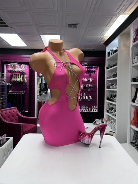 Hot Pink Crystal Cutout mini dress featuring a halter neckline, dramatic front and waist openings, and sparkling crystal lace-up details.