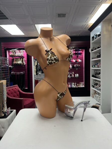 Mocha Cow Print Lingerie two-piece set featuring a triangle top, matching minimal bottom, brown string straps, and satin bow accents.