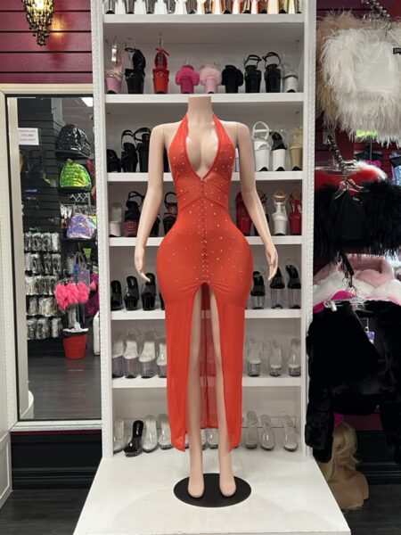 Red Rhinestone Halter Dress with plunging neckline, sparkling crystal details, fitted silhouette, and dramatic front slit.