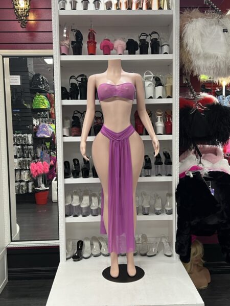 Magenta sheer skirt set with strapless bandeau top and long flowing open-side skirt.