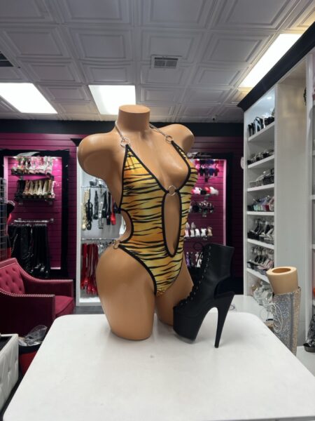 Tiger Cutout Bodysuit with gold tiger print, black trim, front cutout and silver ring hardware