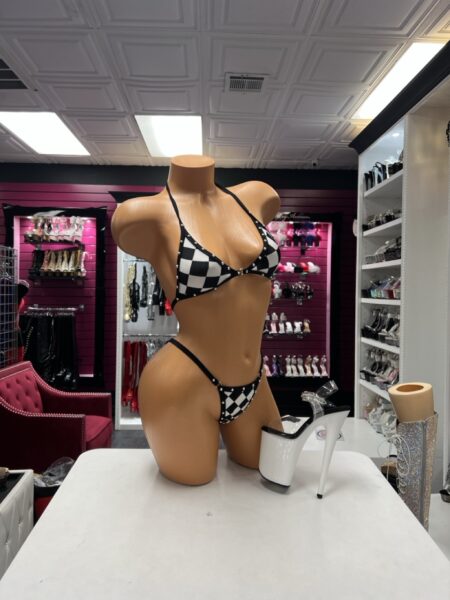 Checkered Crystal Bikini Set featuring a black and white checkerboard print, triangle halter top, matching bottoms, and sparkling crystal trim.