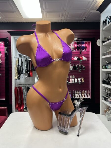 Purple crystal ring bikini two-piece lingerie set with rhinestone trim, silver center hardware, triangle halter top, and matching high-cut bottom.