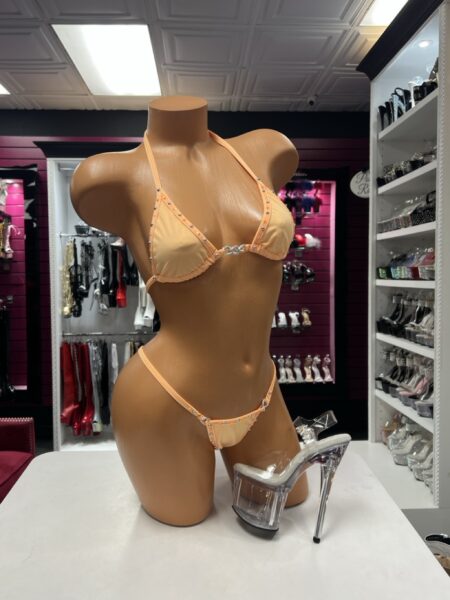 Orange crystal ring bikini two-piece lingerie set with sparkling crystal trim, silver hardware, triangle halter top, and matching high-cut bottom.